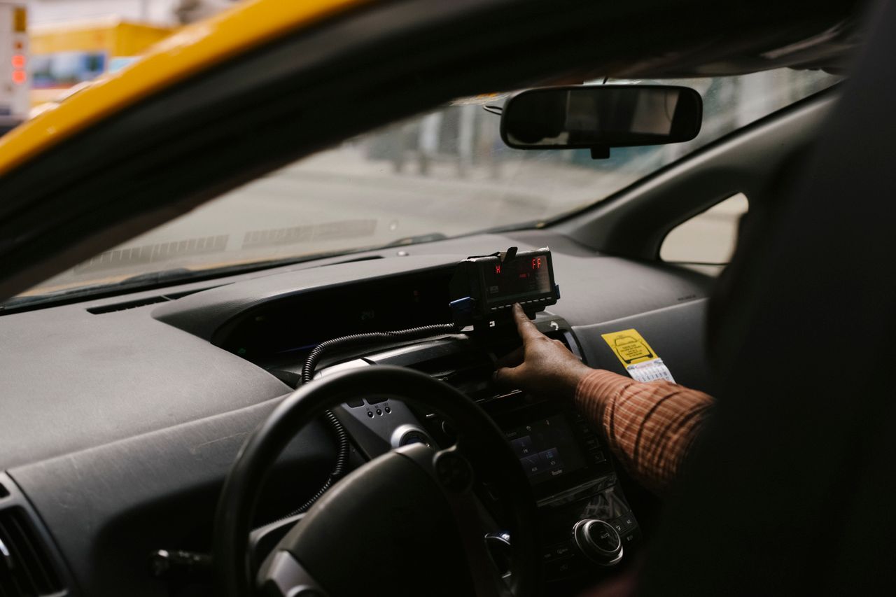 The Art of Drawing Readers In: Your attractive post title goes here Anonymous ethnic male driver with steering wheel using GPS navigator to search direction for drive on street in city during work